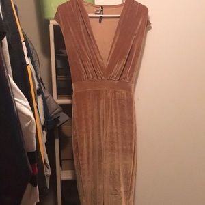 Gold one piece body suit